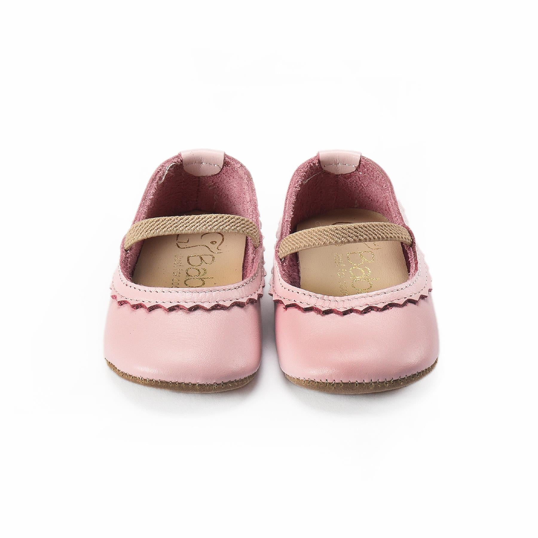 أحذية جلدية للأطفال باللون الوردي